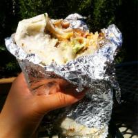Carnitas Burrito · Lean roasted pork with black or pinto beans, rice Jack cheese, sour cream, guacamole, and ch...