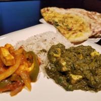 Palak Paneer · Spinach curry cooked with cheese cubes and spices.