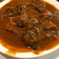 Lamb Vindaloo · Lamb and potatoes cooked in chef's special sauce.