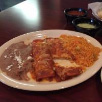 Kid's Cheese Enchilada · Served with rice and beans.
