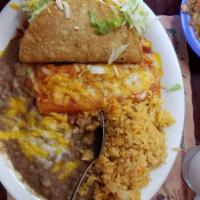 Cheese Enchiladas Combo · 2 pieces. Served with our delicious Spanish rice and refried beans.
