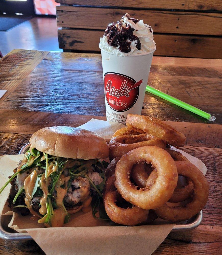 Fresh Prince Burger · provolone cheese // shaved ribeye // pepperoncini peppers // caramelized onion // arugula // chipotle aioli.