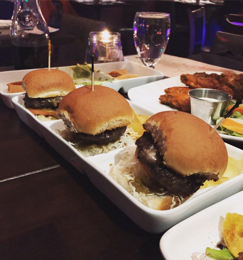 Chimmi Sliders · Marinated ground beef with red onions, manchego cheese, and topped with signature chime sauce.