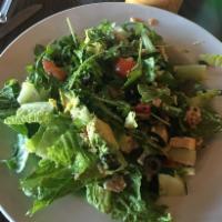 Greek Salad · Choice of protein, romaine, arugula, cucumber, tomatoes, onions, green and black olives, pum...