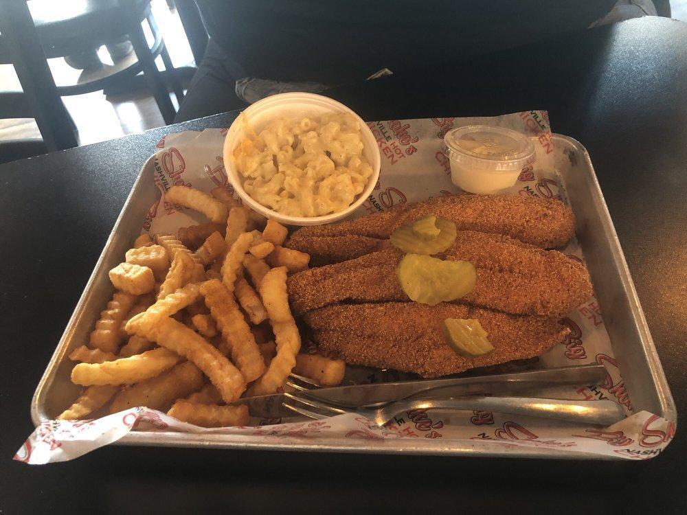 Catfish Platter · Our Catfish Platters include 2 Catfish Fillets, White Bread, Pickles and 2 sides of your choice. Tarter sauce on request.