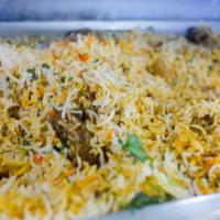 Chicken Biryani · A special treat from the subcontinent. Long grain basmati rice cooked with spicy chicken to ...