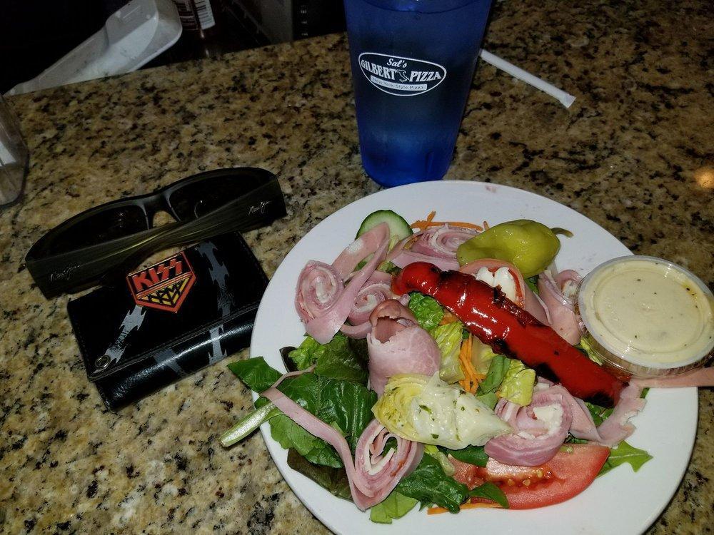 Antipasto Salad · Boar's Head ham, salami, mortadella, capicola and provolone, on mixed greens, cucumber, tomato, onion, olive, artichoke, roasted red peppers and pepperoncini.