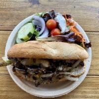 Wild Mushroom Philly · Wild mushrooms & portabella mushrooms, bell peppers, onions, garlic aioli, vegan cream sauce...