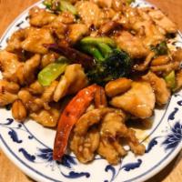 Kung Pao Chicken · Sliced chicken with peanuts in spicy kung pao sauce. Hot and spicy.
