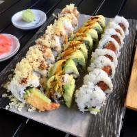 Caterpillar Roll · Broiled fresh water eel, crab meat, and cucumber, topped with thinly sliced avocado. 