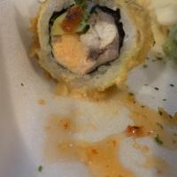 Ninja Roll · Four kinds of fish, avocado, deep fried with special sauce.