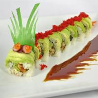 Dragon Roll · Eel and cucumber wrapped in avocado topped with caviar served with eel sauce.