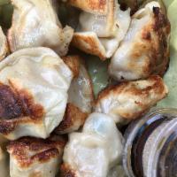 Pork & Chive Pan Fried Dumplings · 12 pieces.