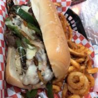 Philly Steak Sandwich · Steak sandwich with sauteed onions, mushrooms, and bell peppers covered with melted pepper j...