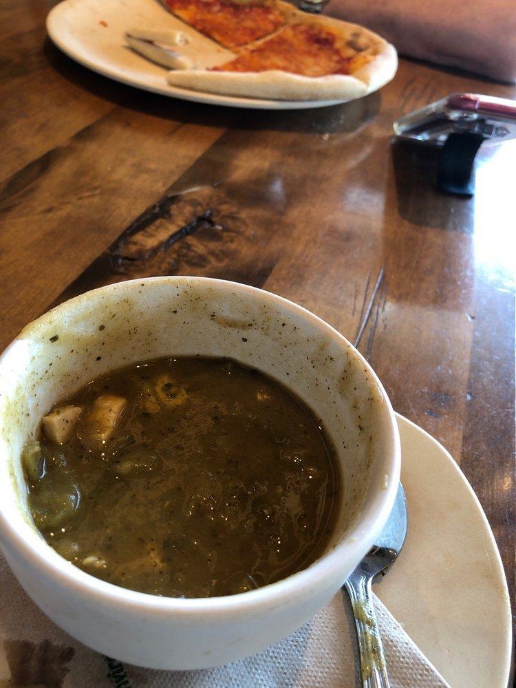 Green Chicken Chili · Our signature soup is loaded with roasted tomatillos and chilis, tender hominy, and freshly roasted chicken breast. Warmly spicy and flavor-packed, we thicken it with authentic masa to keep it dairy- and gluten-free.