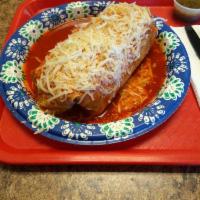 Wet Burrito · A regular burrito smothered with a red or green sauce with melted shredded cheese on top.