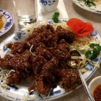 Sesame Beef Special · Spicy. Deep fired sliced beef sauteed in famous sesame sauce.