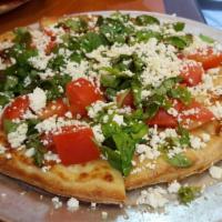 Armenian Pizza · Without sauce. Tomatoes, basil and feta cheese. 