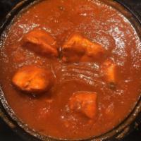 Chicken Vindaloo · Cubes of chicken breast cooked with fresh ginger and potato in a tangy sauce.
