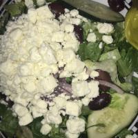 Greek Salad · Kalamata olives, feta cheese, red onions, and cucumber.