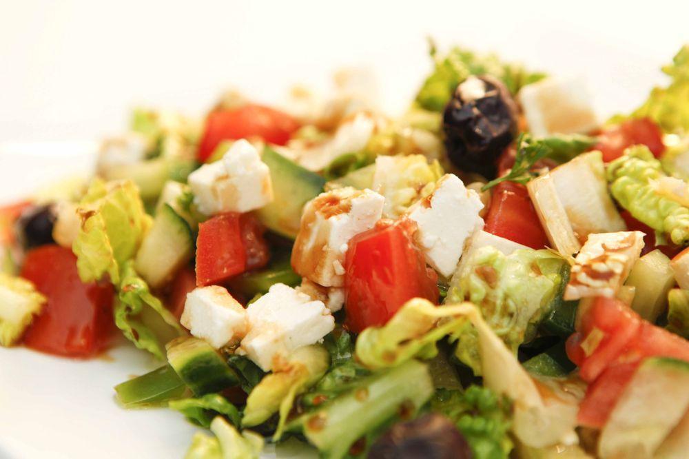 Greek Salad · Lettuce, tomato, cucumber, onion, green bell pepper, Kalamata olives, feta cheese and Greek salad dressing.