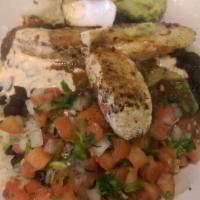 California Bowl · Made with citrus rice, black beans, and fresh romaine lettuce topped with handmade guacamole...