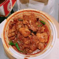 38a. Chicken Rendang · Dark meat chicken slowly cooked with a paste of ground onions, lemongrass, chili and potato....