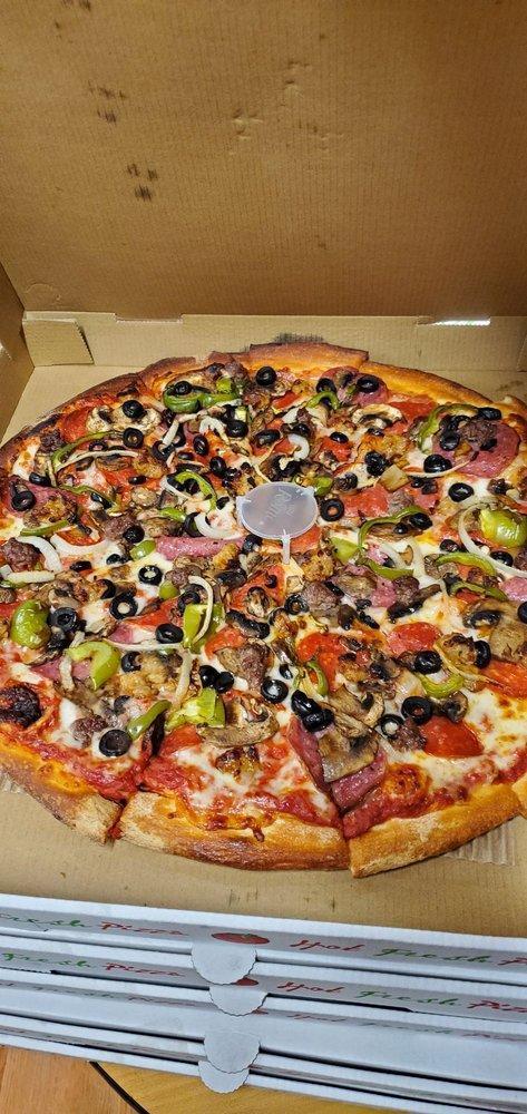 Royal Supreme Pizza · Marinara sauce, mozzarella cheese, salami, pepperoni, Italian sausage, ground beef, mushrooms, yellow onions, bell peppers and olives. All pizza crusts are brushed with butter sauce.