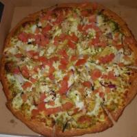 Pesto Lovers Pizza · Pesto sauce, mozzarella cheese, feta cheese, artichoke hearts, minced garlic, red onions and...