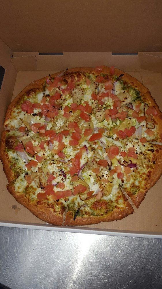 Pesto Lovers Pizza · Pesto sauce, mozzarella cheese, feta cheese, artichoke hearts, minced garlic, red onions and fresh tomatoes. All pizza crusts are brushed with butter sauce.