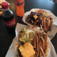 Double Bacon Cheeseburger Meal · Includes fries and a drink. Condiments on the side