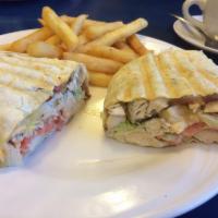 Meadowlands Wrap · Grilled chicken, bacon, melted Swiss cheese, lettuce, tomato, onions, and honey mustard.

