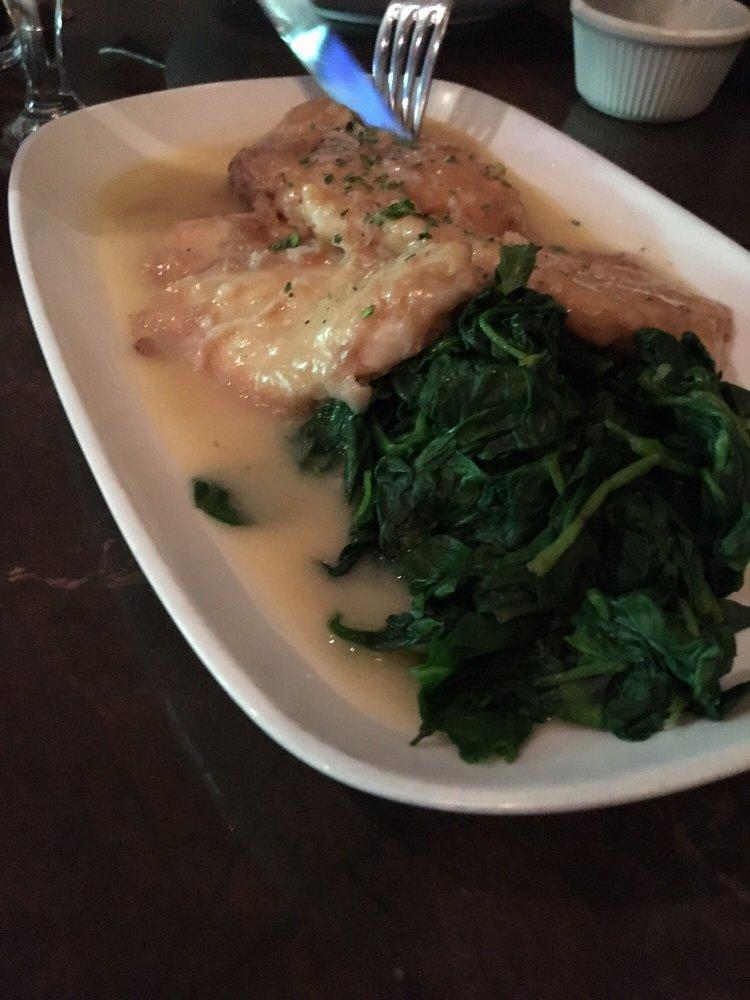 Lemon Chicken · Chicken breast egg battered and pan sauteed in a lemon butter wine sauce served with spinach.