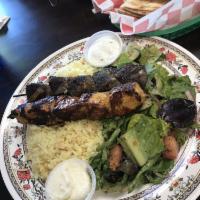 Combo Plate · Choice of any 2 meats or falafel served with rice pilaf, salad, and tzatziki. Served with pi...
