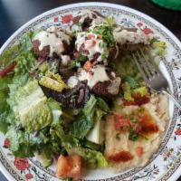 Falafel Plate · 5 falafel served with hummus and salad. Served with pita bread.