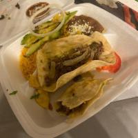 Pirata Plate · 2 flour tortillas, white melted cheese, beef steak, avocado, grilled onions, rice and refrie...