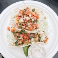 Fish Tacos · 3 soft tortillas filled with our blackened fresh catch, cabbage, and homemade mango salsa. S...