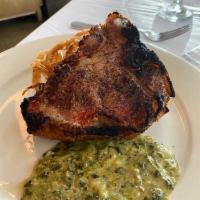 Grilled Veal Chop · Lemon and rosemary marmalade.