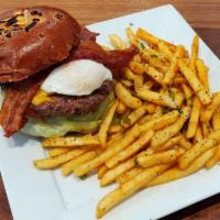 Califas Burger · 8 oz american kobe burger with sharp cheddar on a toasted onion bun with chipotle aioli, let...