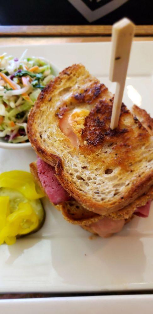 Reuben · Tender corned beef topped with Swiss, sauerkraut and 1000 island on grilled rye.  Substitute smoked turkey.