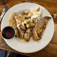 French Toast · on house-made brioche bread with fresh berries, whipped cream and maple syrup