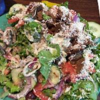 Gyro Salad · Thin sliced gyro meat, served over lettuce, tomato, onions, cucumber with tzatziki sauce.