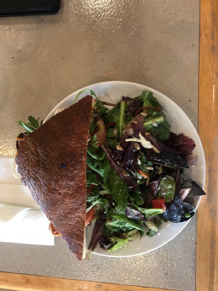 Roasted Sweet Potato Sandwich · roasted sweet potato, goat cheese, fig confit, tomato, organic arugula, fennel, balsamic vinaigrette on herb focaccia & served with a side