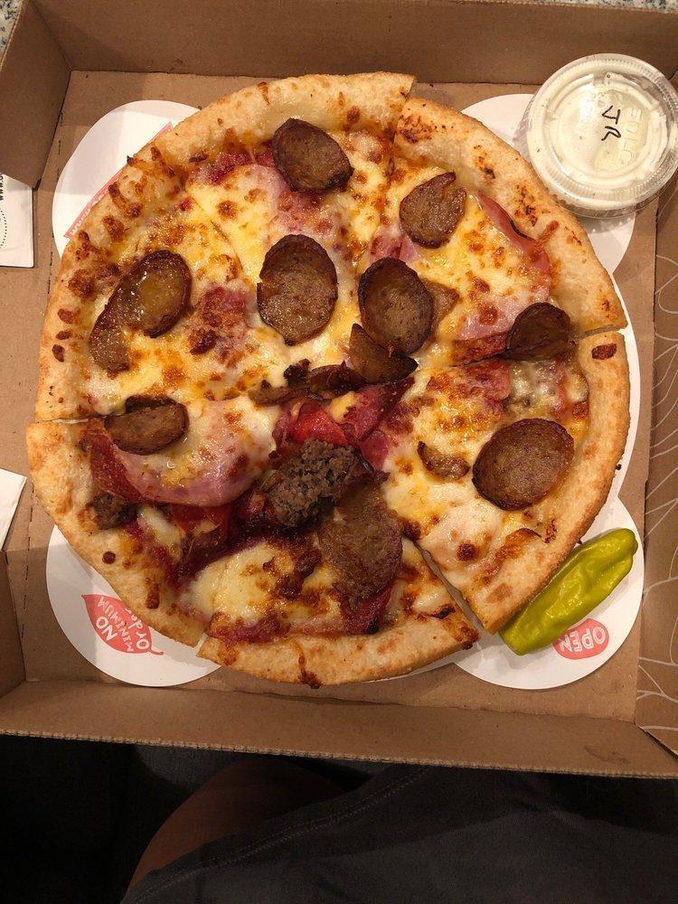 New York Deli Pizza · Pepperoni, salami, spicy Italian sausage, Canadian bacon, lean ground beef and gourmet cheese blend. Served with your choice of dipping sauce.