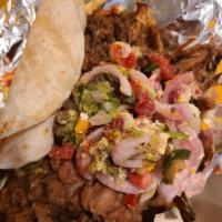 Carnitas Plate · Homemade braised pork marinated with orange, beer, chipotle, and spices. Topped with pickled...