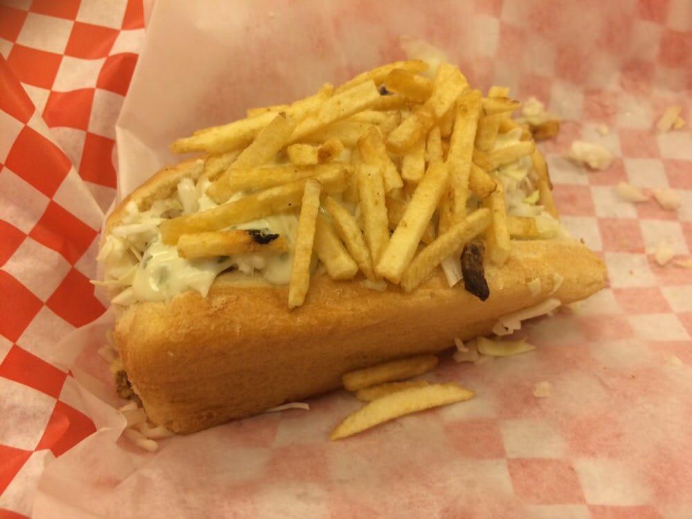 Central Park Hot Dog · Cabbage, onion, potato sticks, mustard, ketchup, and engy sauce.