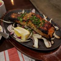 Tandoori Salmon · Wild salmon marinated in spices, garlic and ginger.