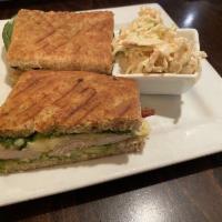 Grilled Chicken Avocado Club Panini · Hardwood smoked bacon, Swiss, avocado and lettuce, tomato and herb mayo. Substitute turkey b...