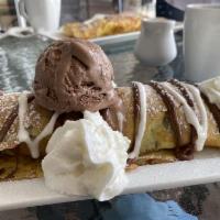 The Original Rocky Road Crepe · Brownie, walnuts, Nutella, marshmallow cream, chocolate chips, whipped cream and chocolate g...