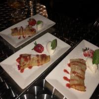 Strawberry Crepe · Topped with chocolate sauce.